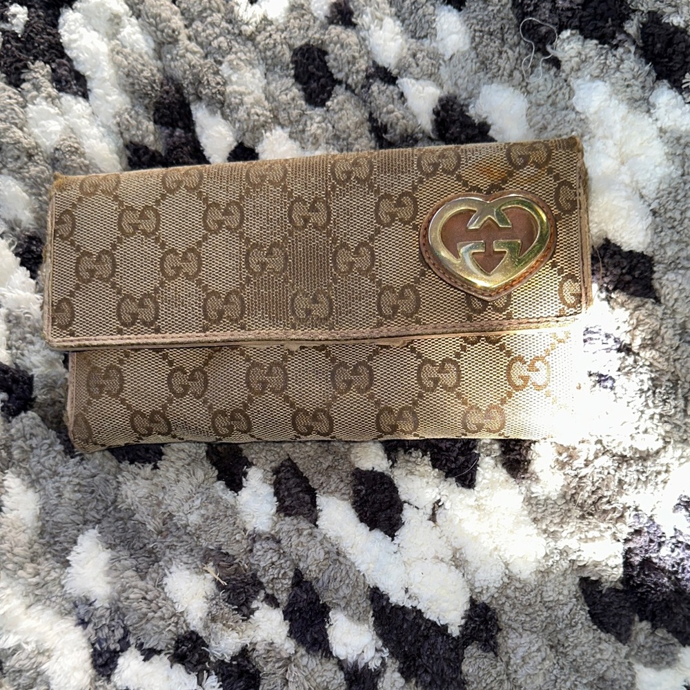 Gucci Tan Monogram long wallet with Gold Accent heavily used/damaged
